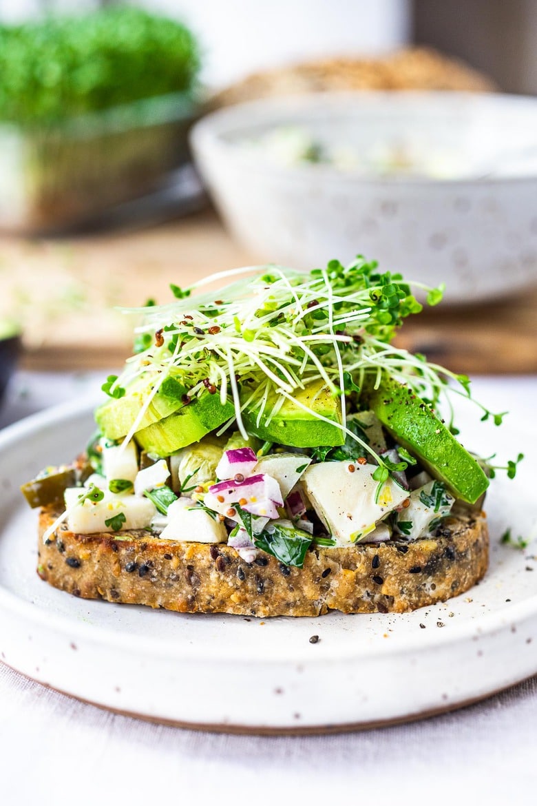 This Vegan Tuna Salad is made with hearts of palm (without chickpeas) and includes all the classic ingredients of traditional tuna salad. Vegan, plant-based and full of flavor, this healthy flavorful salad can be turned into wraps or sandwiches!