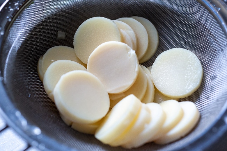 hearts of palm in a strainer