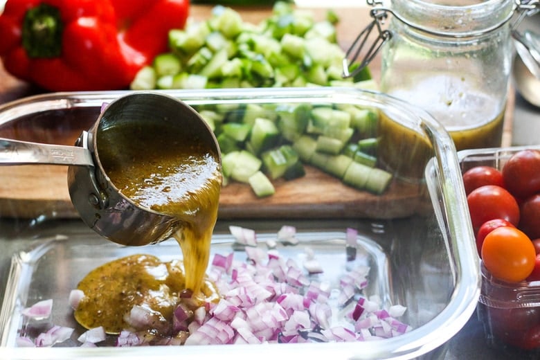 In a bowl add onions and dressing first