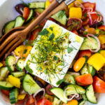 This Greek Salad is everything you want in a summer salad- refreshing, vibrant, flavorful and healthy. Simple ingredients and can be made in 20 mins! #greeksalad