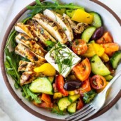 This Grilled Chicken Greek Salad is light and healthy and full of so much flavor! The perfect summer dinner!