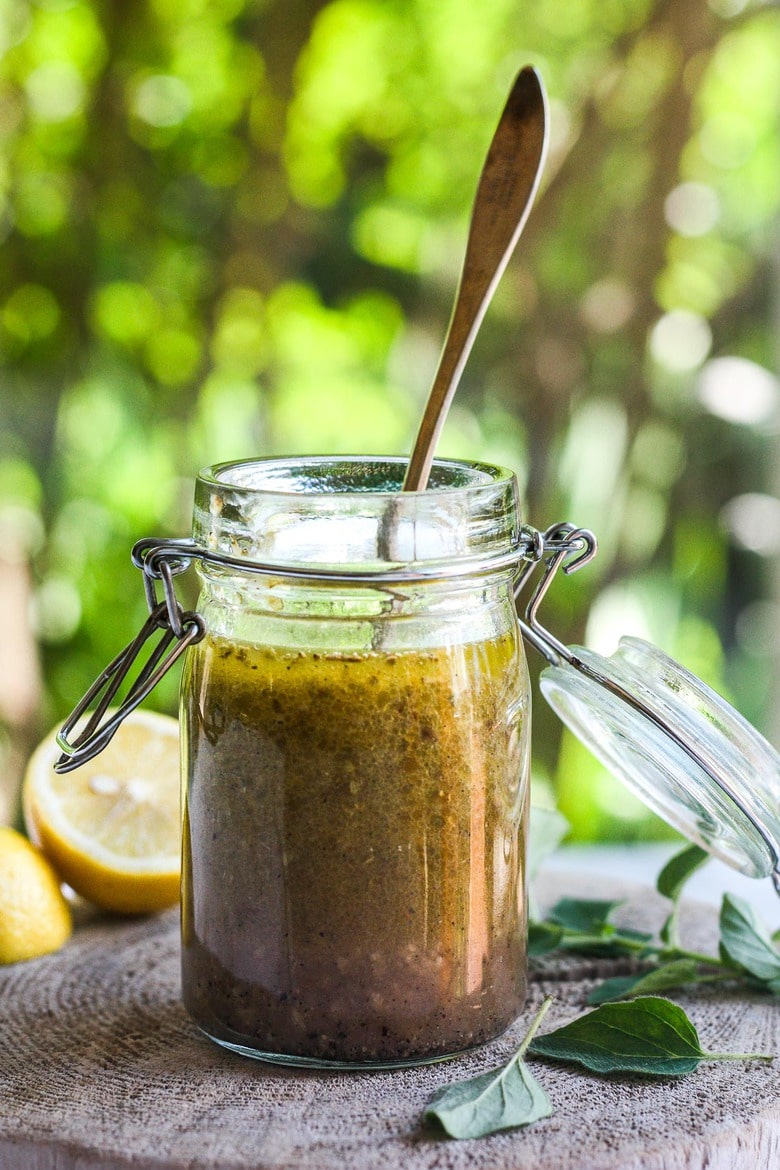 Quick and healthy Greek Salad Dressing is delicious, easy to make and so versatile.  A tasty perk for vegetable salads, pasta salad, chicken marinade and more!