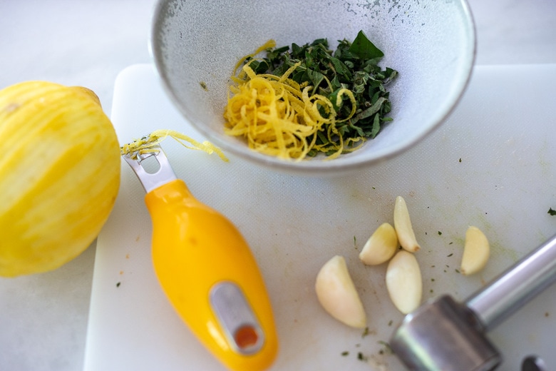 marinade ingredients- garlic, lemon zest and herbs