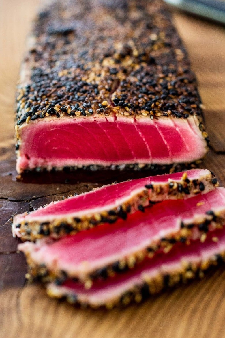 Seared Tuna with Sesame Seed Crust. Learn how to make the best Sesame Crusted Ahi Tuna- crispy golden on the outside and rare on the inside in just 10 minutes flat!
