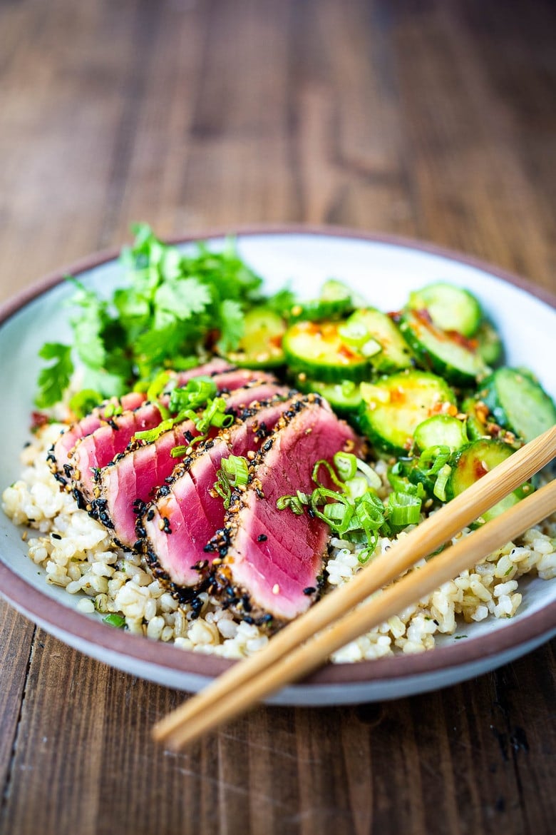 Seared Tuna with Sesame Seed Crust. Learn how to make the best Sesame Crusted Ahi Tuna- crispy golden on the outside and rare on the inside in just 10 minutes flat!