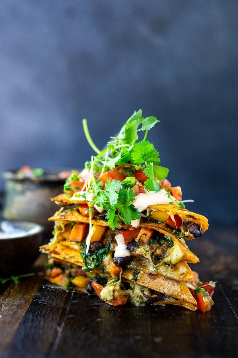 Farmers Market Veggie Quesadillas with black beans and farmer's market veggies like bell peppers, zucchini, sweet potato, greens, and melty cheese (optional) seasoned with Mexican spices. Vegan-adaptable and Gluten-free adaptable!
