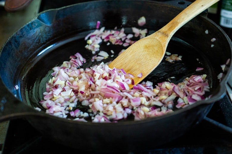 onion and garlic sautéing in a pan