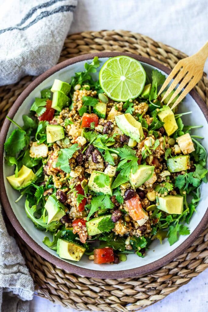 This Black Bean Quinoa Salad is quick and easy to put together and full of fresh Southwest flavors- perfect for casual summer gatherings, potlucks and bbqs. Vegan and Gluten-Free!