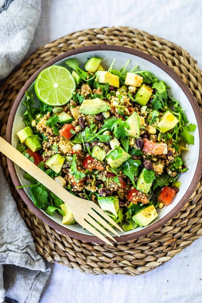 This Black Bean Quinoa Salad is quick and easy to put together and full of fresh Southwest flavors- perfect for casual summer gatherings, potlucks and bbqs. Vegan and Gluten-Free!