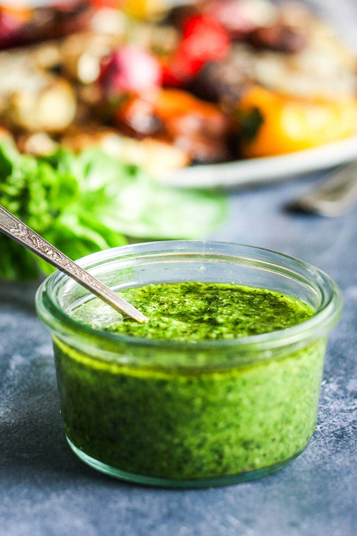 This fresh Basil Pesto recipe is brimming with bright and savory peppery basil goodness!  This version is nut-free, made with nutritious hemp seeds and a splash of lemon.