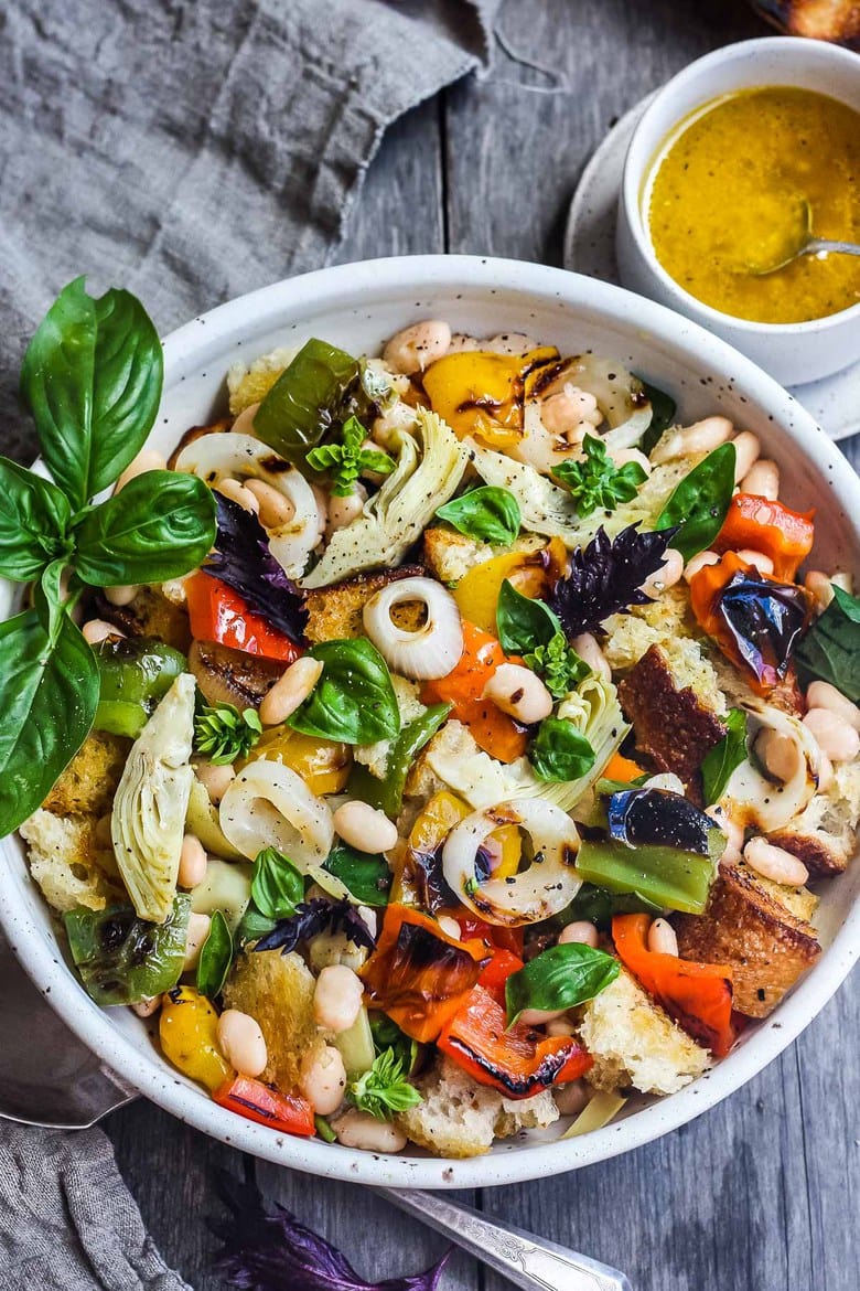 50 Best Grilling Recipes for Summer | Delicious Grilled Tuscan Bread Salad with colorful sweet bell peppers, artichoke hearts and white beans tossed in a flavorful white balsamic dressing.  Make it on the barbecue for an easy outdoor summer meal with your favorite grilled protein!  Vegan!