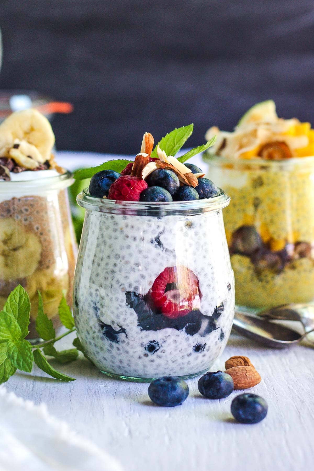 Chia pudding in jars with berries.