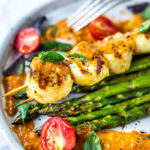 Grilled Scallops, marinated with olive oil, orange zest, coriander, salt and pepper, topped with Charred Tomato Vinaigrette. A delicious summer dinner that is fast, easy, light, refreshing and elegant! #grilledscallops