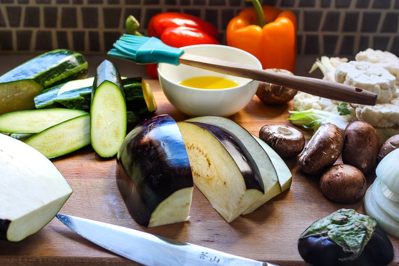 cutting and oiling veggies