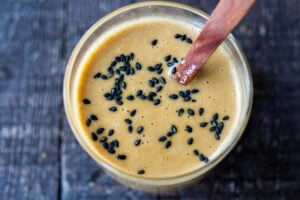 How to make the best Miso Dressing! Made with ginger, miso paste and sesame oil, the flavors complement salads, grain bowls, veggie bowls, Asian-style slaws or grilled or roasted veggies.