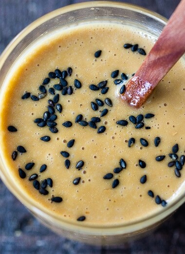 How to make the best Miso Dressing! Made with ginger, miso paste and sesame oil, the flavors complement salads, grain bowls, veggie bowls, Asian-style slaws or grilled or roasted veggies.