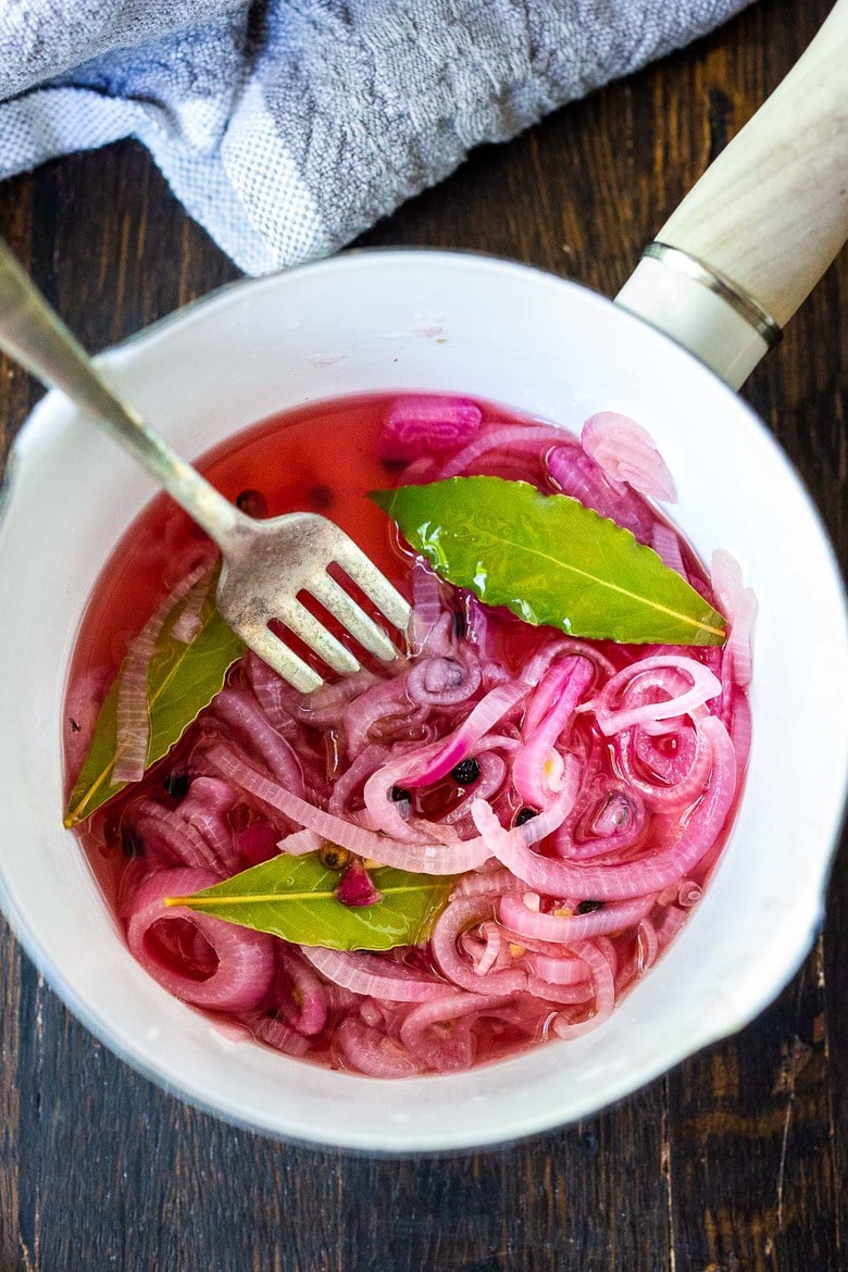 Quick and easy Pickled Shallots require only 10 minutes of hands-on time before going in the fridge to chill.  Use in sandwiches, wraps, salads, to add a bit of zippy brightness. #pickledshallots