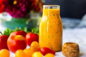 This summery recipe for Tomato Vinaigrette is delicious on salads, or spooned over fish or chicken, or even used as a marinade for grilling!  #tomatovinaigrette