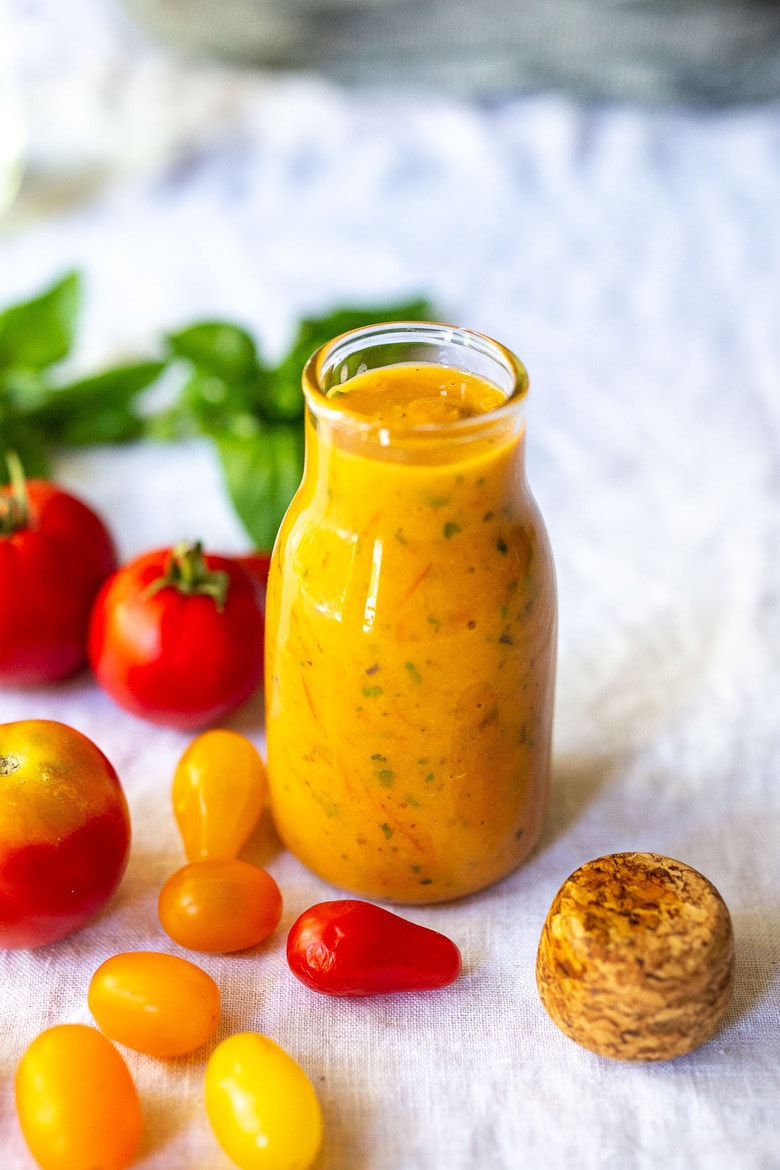 This summery recipe for Tomato Vinaigrette is delicious on salads, or spooned over fish or chicken, or even used as a marinade for grilling!  #tomatovinaigrette