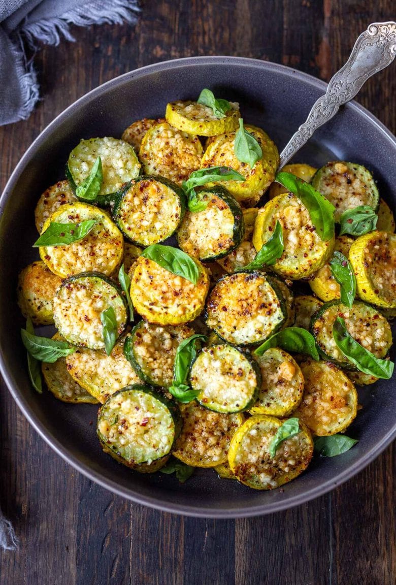 Crispy Baked Zucchini with Pecorino and Basil- a crispy flavorful zucchini side dish that is simply irresistible and pairs well with many things!