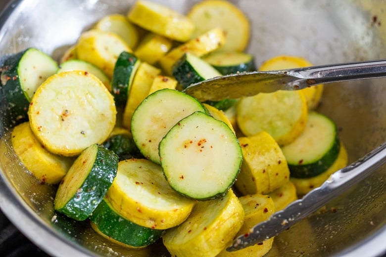 toss the zucchini with olive oil, salt, pepper and chili flakes 