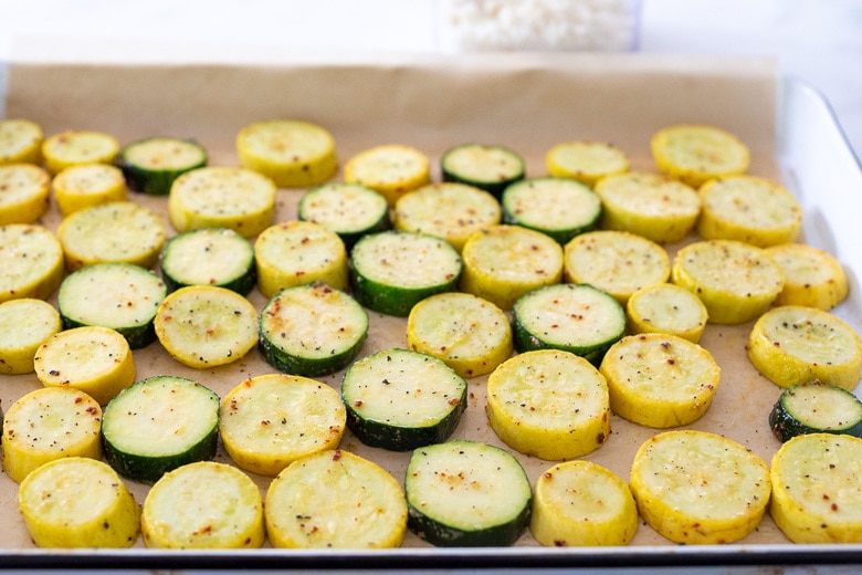 Place the zucchini on a parchment lined sheet pan 