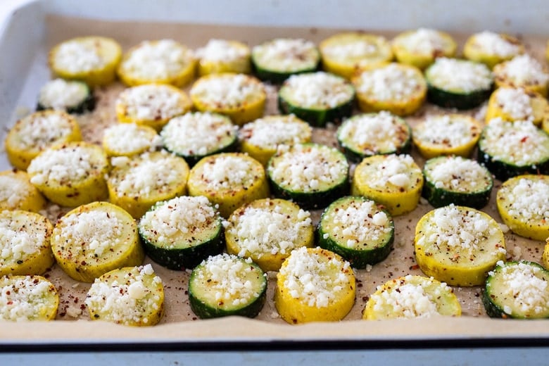 sprinkle the zucchini with parmesan or pecorino cheese