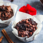 Double Chocolate Zucchini Muffins with Dried Cherries have a hint of spice and are richly satisfying -a delicious treat with a bit of healthy tucked inside!