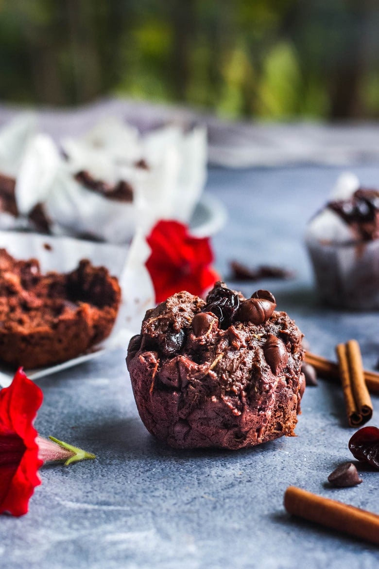 Double Chocolate Zucchini Muffins with Dried Cherries have a hint of spice and are richly satisfying -a delicious treat with a bit of healthy tucked inside!