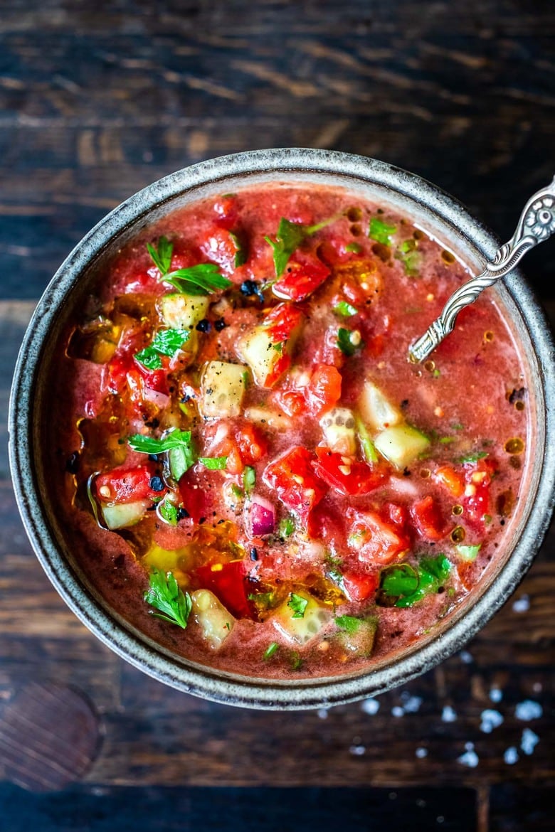 Chunky Gazpacho: A quick and easy recipe for Gazpacho, a chilled, no-cook, Spanish soup highlighting ripe and juicy summer tomatoes. Vegan and gluten-free with several variations!  #gazpacho #coldsoup #vegansoup