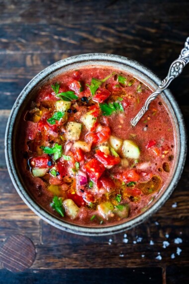 A quick and easy recipe for Gazpacho, a chilled, no-cook, Spanish soup highlighting ripe and juicy summer tomatoes. Vegan and gluten-free with several variations!  #gazpacho #coldsoup #vegansoup