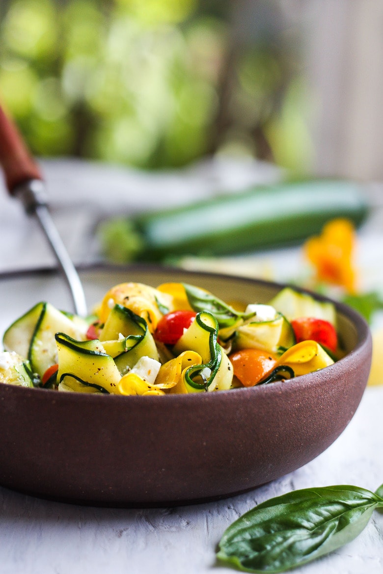 Sautéed Zucchini Ribbons with lemon zest, garlic and chili flakes.  A fast & healthy side dish that is healthy and delicious. Vegan-adaptable. 