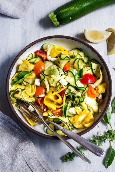 Sautéed Zucchini Ribbons with lemon zest, garlic and chili flakes.  A fast & healthy side dish that is healthy and delicious. Vegan-adaptable.