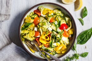 Sautéed Zucchini Ribbons with lemon zest, garlic and chili flakes.  A quick and simple side dish- delicious with grilled protein for dinner or try it with eggs for breakfast.  Keep it vegan or jazz it up with cheese.