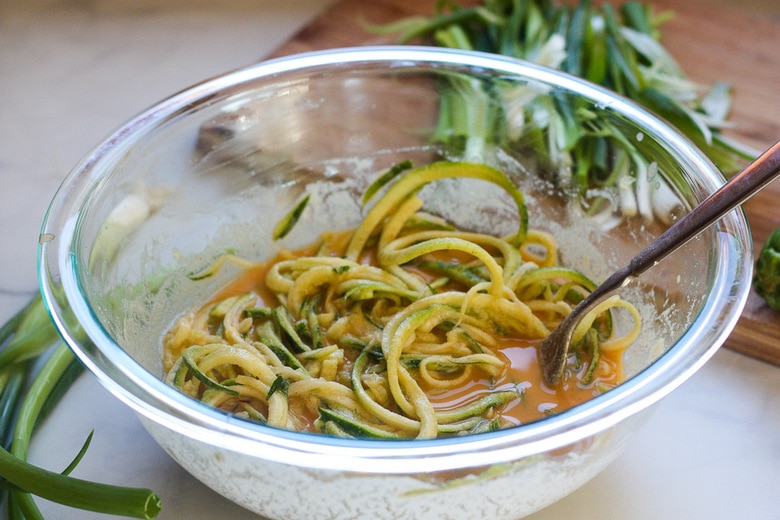 mixing vegetables and batter