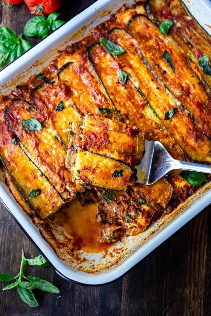 zucchini lasagna with spatula picking up a piece.