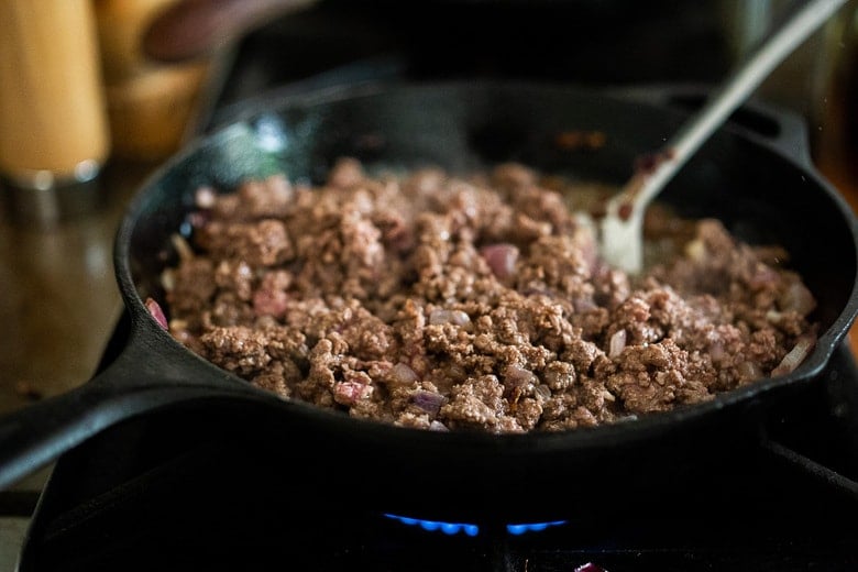 browning ground lamb in a skillet