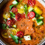 A quick and easy recipe for Gazpacho, a chilled, no-cook, Spanish soup highlighting ripe and juicy summer tomatoes. Vegan and gluten-free with several variations!