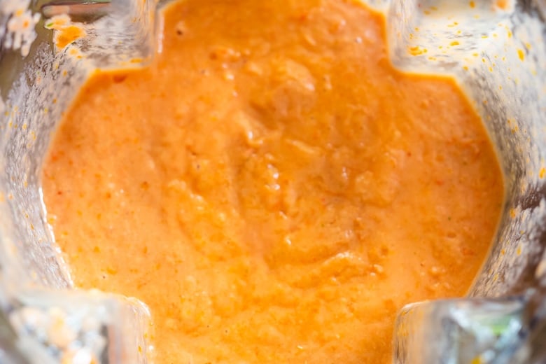 creamy blended smooth gazpacho with olive oil.
