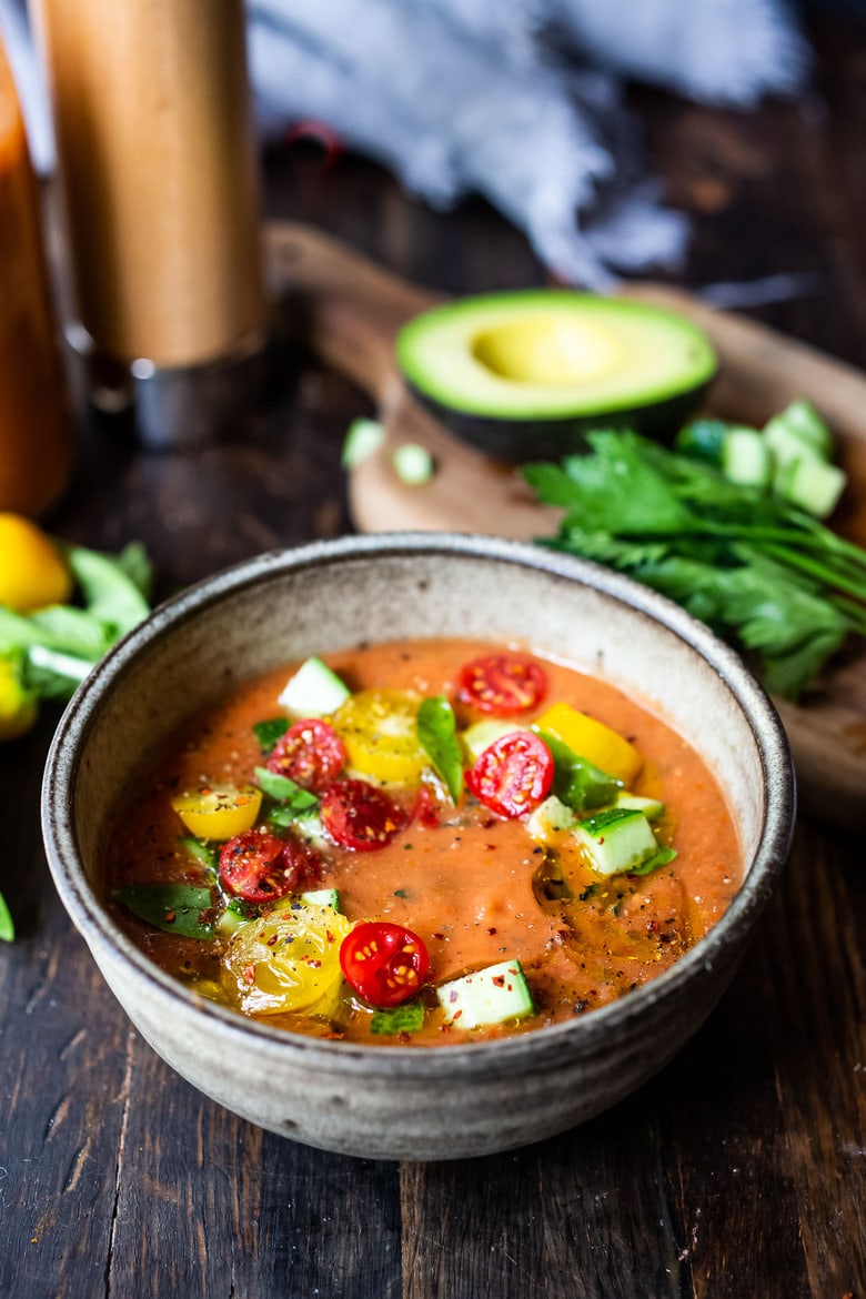 A quick and easy recipe for Gazpacho, a chilled, no-cook, Spanish soup highlighting ripe and juicy summer tomatoes. Vegan and gluten-free with several variations! 