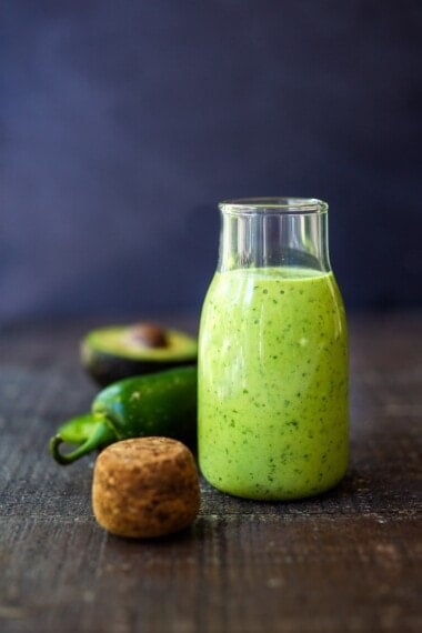 Creamy Vegan Avocado Dressing with cilantro, lime, and jalapeno- a delicious addition to salads, bowls, tacos, enchiladas, and burritos that can be made in 5 minutes.