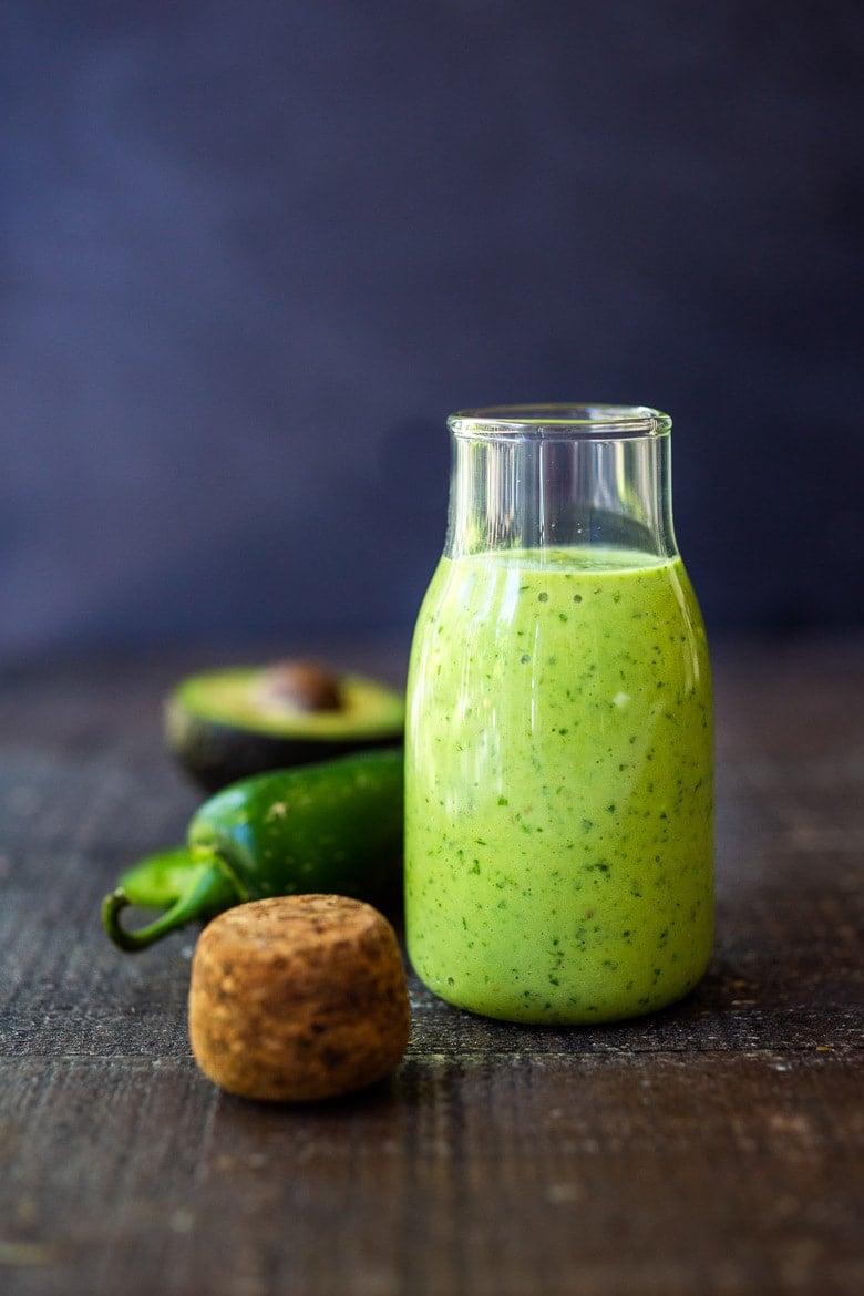 Creamy Vegan Avocado Dressing with cilantro, lime, and jalapeno- a delicious addition to salads, bowls, tacos, enchiladas, and burritos that can be made in 5 minutes.