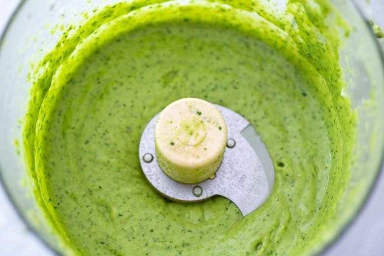  avocado sauce ingredients in a food processor, blended until smooth and creamy.