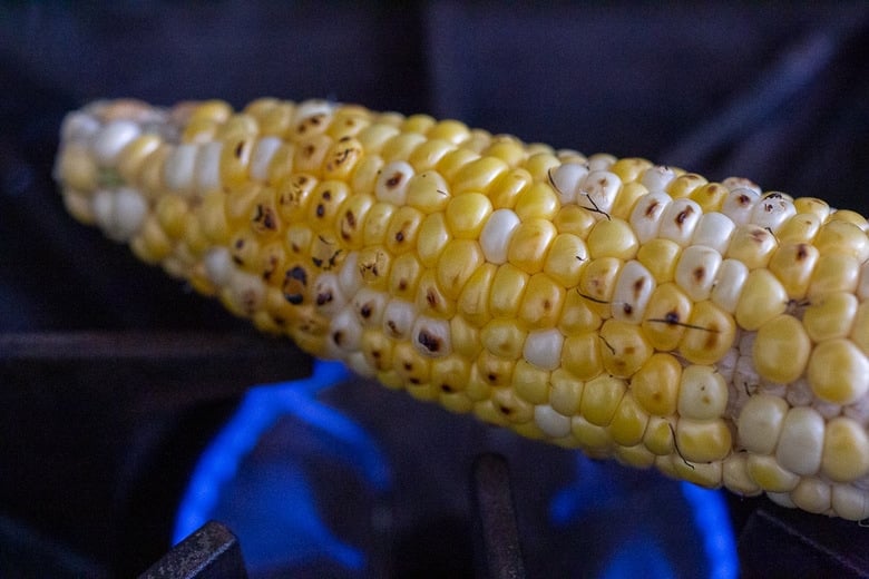 corn charring on a gas burner 