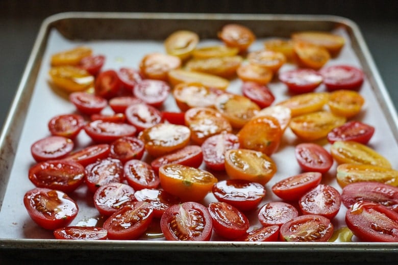 tomatoes roasting on pan