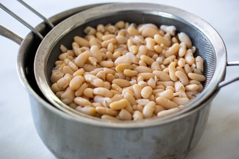 cannellini beans in a strainer