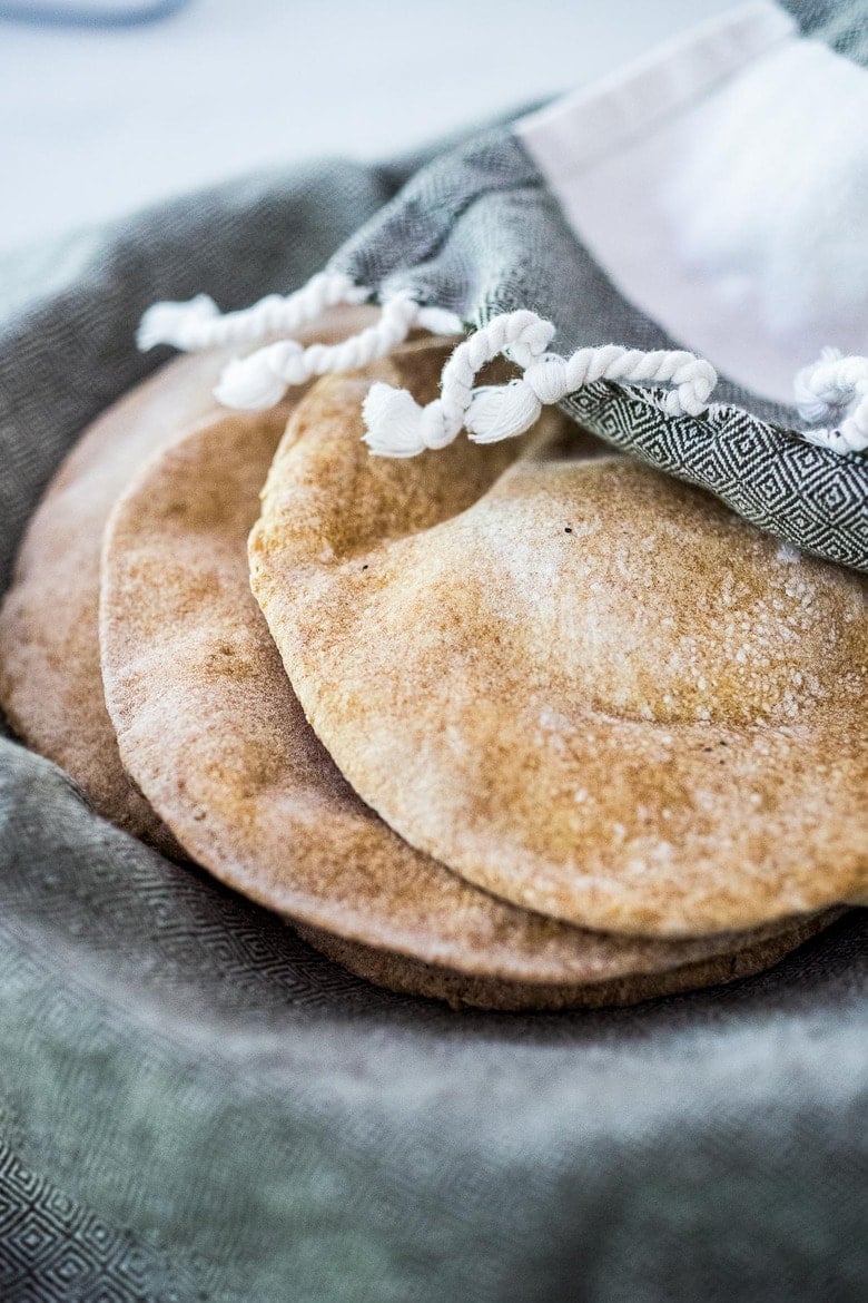 How to make homemade pita bread- a simple step by step recipe that turns out perfect every time! #pitabread #pitarecipe #bestpitabread #easypitabread 