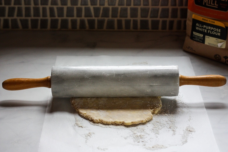 rolling out pie dough