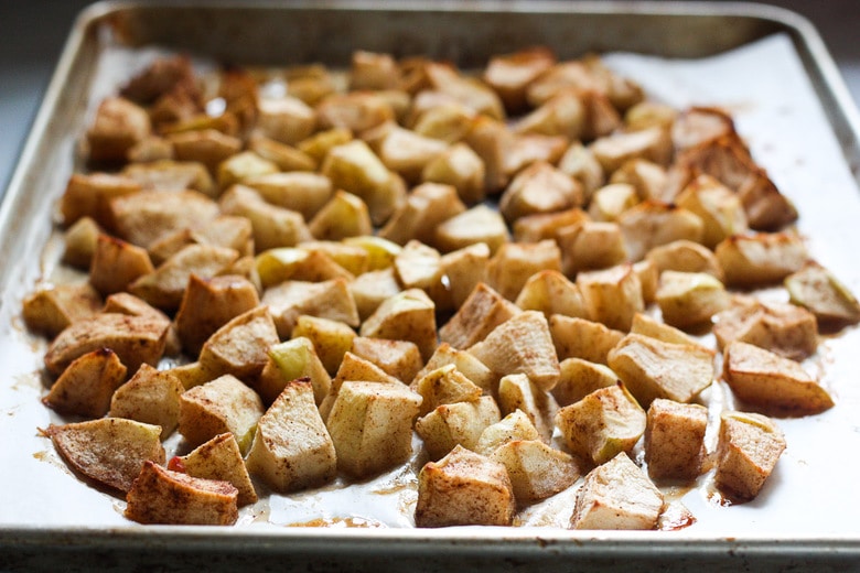 roasted apples on a pan