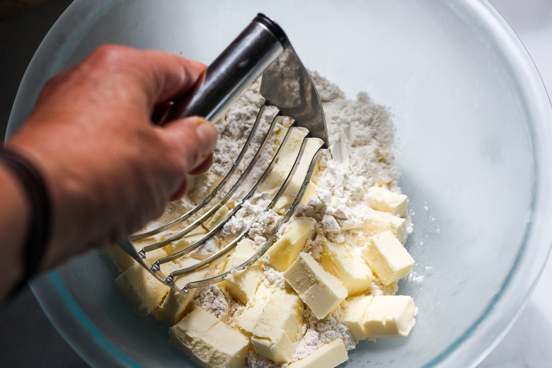 cutting butter into the flour